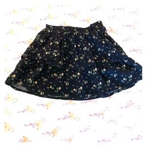 Navy blue and floral, layered skirt.